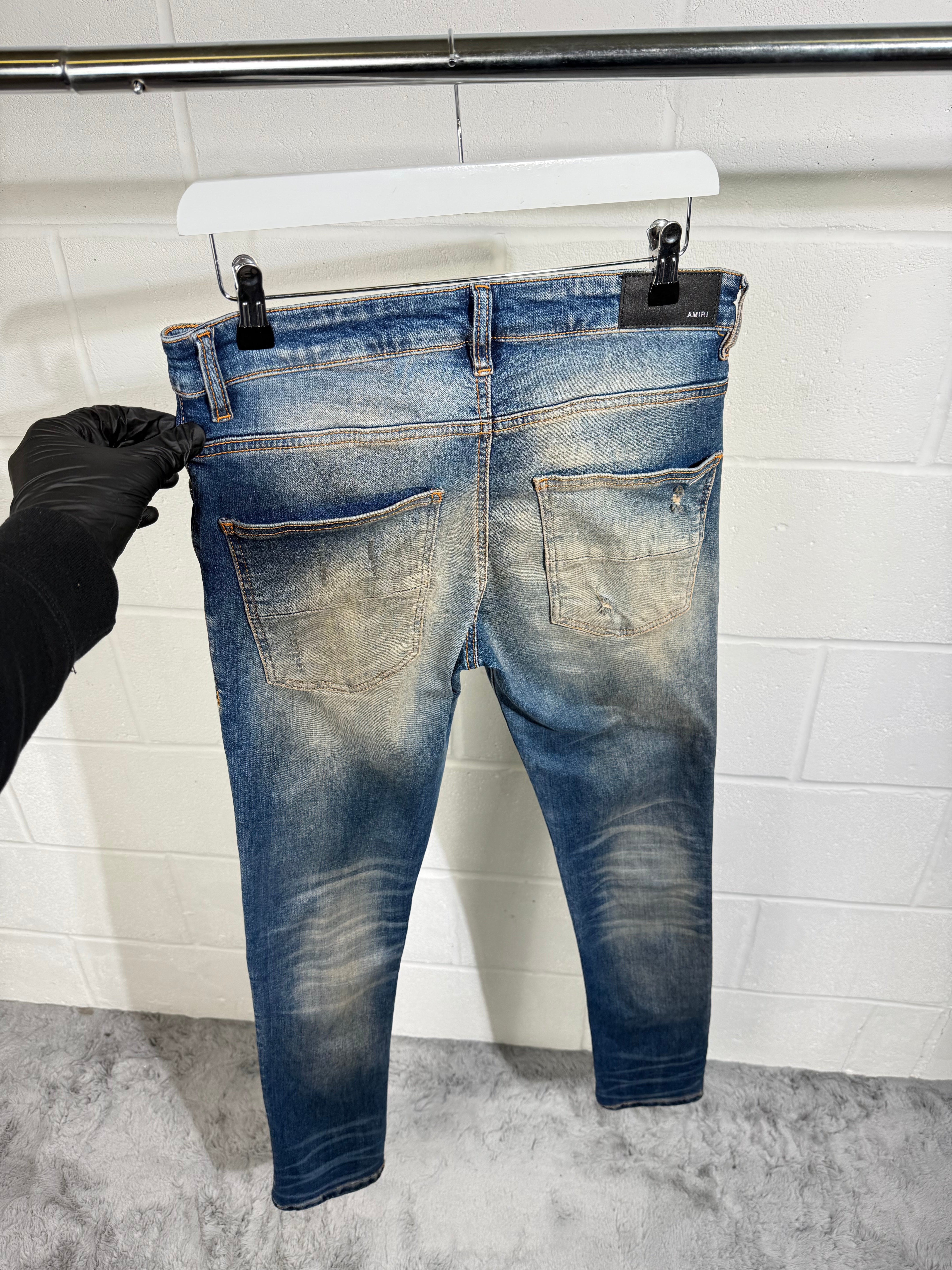AMIR ripped jeans